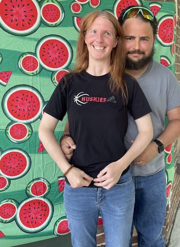 Attendees smiling and celebrating at the Watermelon Explosion event.